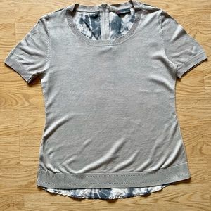 Contemporary short-sleeve beige knit top with cream/gray sheer patterned back